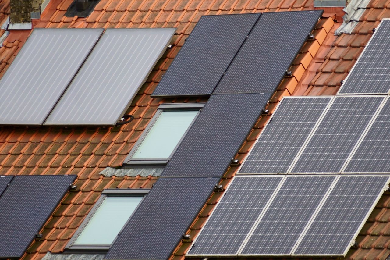 Crafting Captivating Headlines: Your awesome post title goes here Close-up of solar panels on a tiled roof, showcasing sustainable energy solutions.